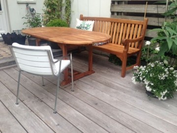 Teakhout tuintafeluitschuifbaar ovaal sfeer