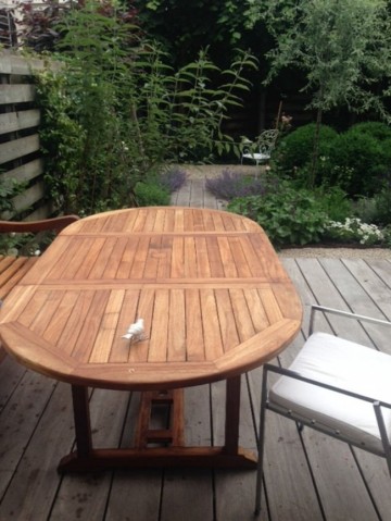 Teakhout tuintafeluitschuifbaar ovaal sfeer1